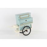 Property of a lady - a child's vintage pale blue painted model barrel organ, in working order (