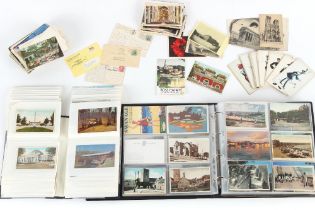 Two albums and a sleeve containing picture postcards, mostly mid 20th century, some earlier,