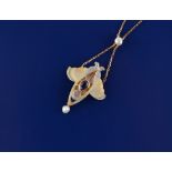 An Art Nouveau plique a jour sapphire pearl & diamond pendant on chain necklace, 17.75ins. (