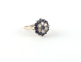 Property of a deceased estate - an 18ct white gold (tested) sapphire & diamond cluster ring, the