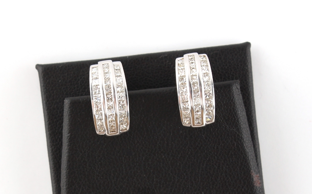 A pair of 18ct white gold diamond half hoop earrings, each set with three rows of diamonds, with - Image 2 of 3