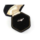 Property of a gentleman - a platinum diamond & ruby ring, the round brilliant cut diamond weighing