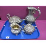 A Mappin & Webb Plated Four Piece Tea Set, each of lobed design with scroll handles, raised on