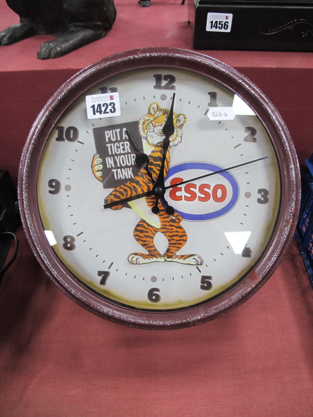 A Circular Esso Wall Clock, - Put a Tiger in Your Tank.
