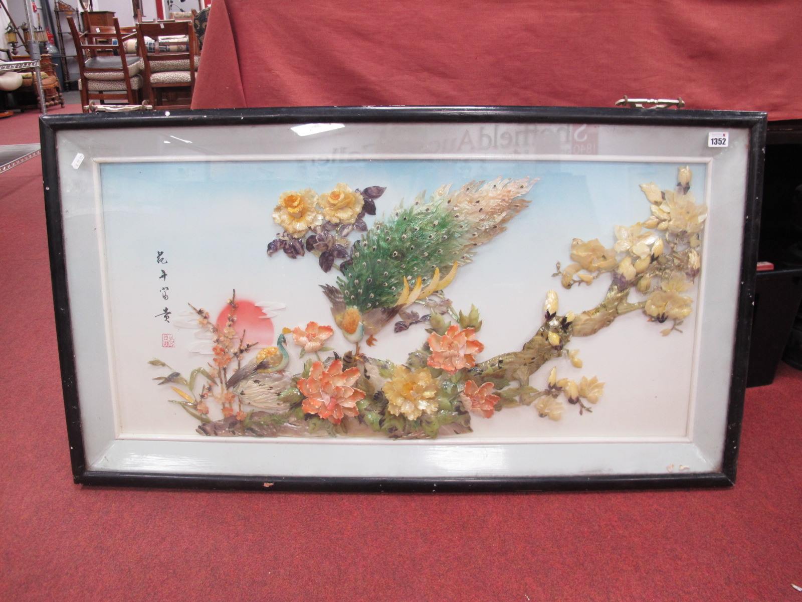 Japanese Montage of Exotic Bird, amongst foliage in ebonised frame, 60 x 108cm.