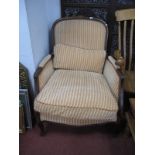 A French Style Armchair, with upholstered back arms, seat on cabriole legs