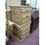 A Pair of Pine Bedside Chests, with three small drawers, on plinth bases, 61cm wide.