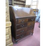 A Mahogany Bureau by Northampton Cabinet Co, London, fall front over four drawers on cabriole