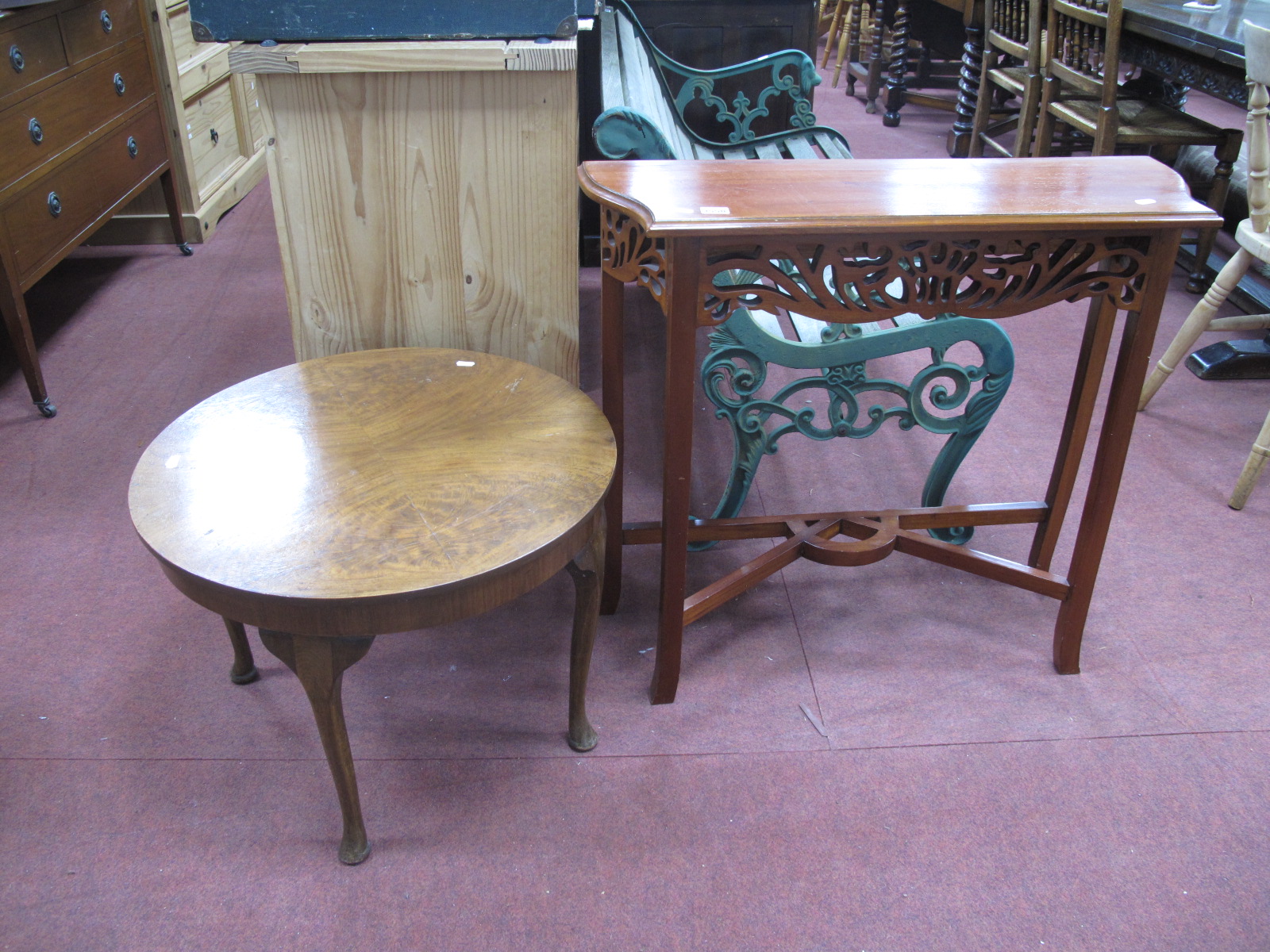 A XX Century Walnut Circular Coffee Table, on cabriole legs, together with a hardwood console