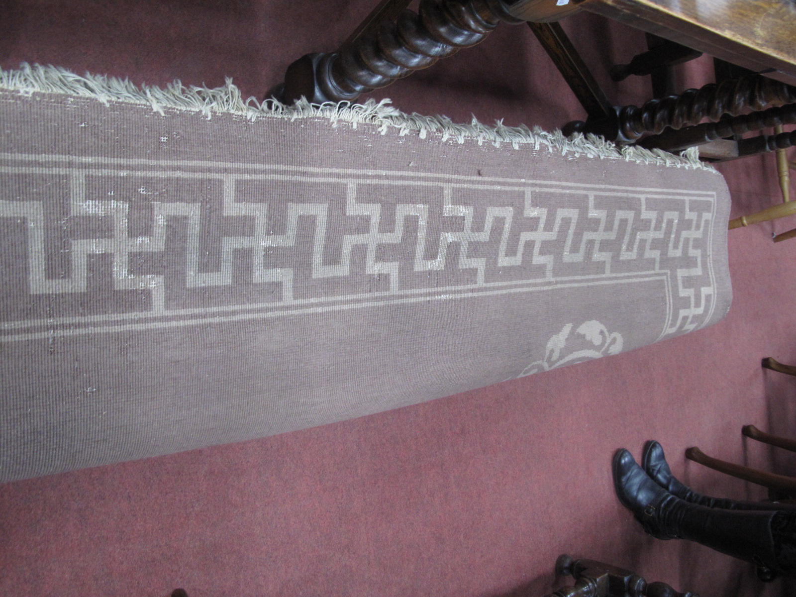 A Chinese Wool Tassled Carpet, with floral motifs, within Swastika border, on brown ground, no - Image 5 of 5