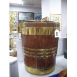 A XIX Century Mahogany Bound Peat Bucket, of coopered construction, 34cm high.