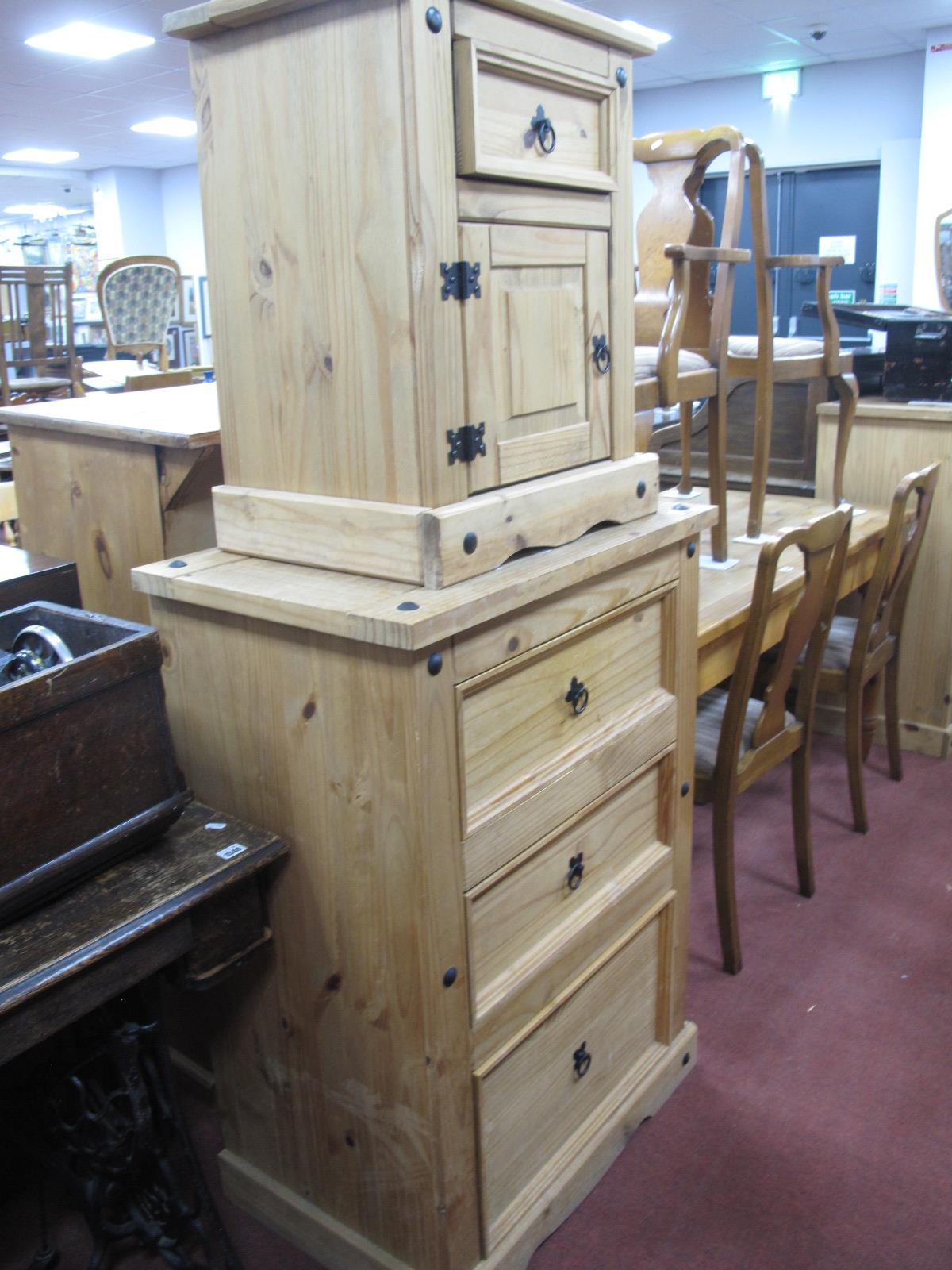 A Pine Chest of Drawers, with three short drawers, on plinth base, with black stud decoration,