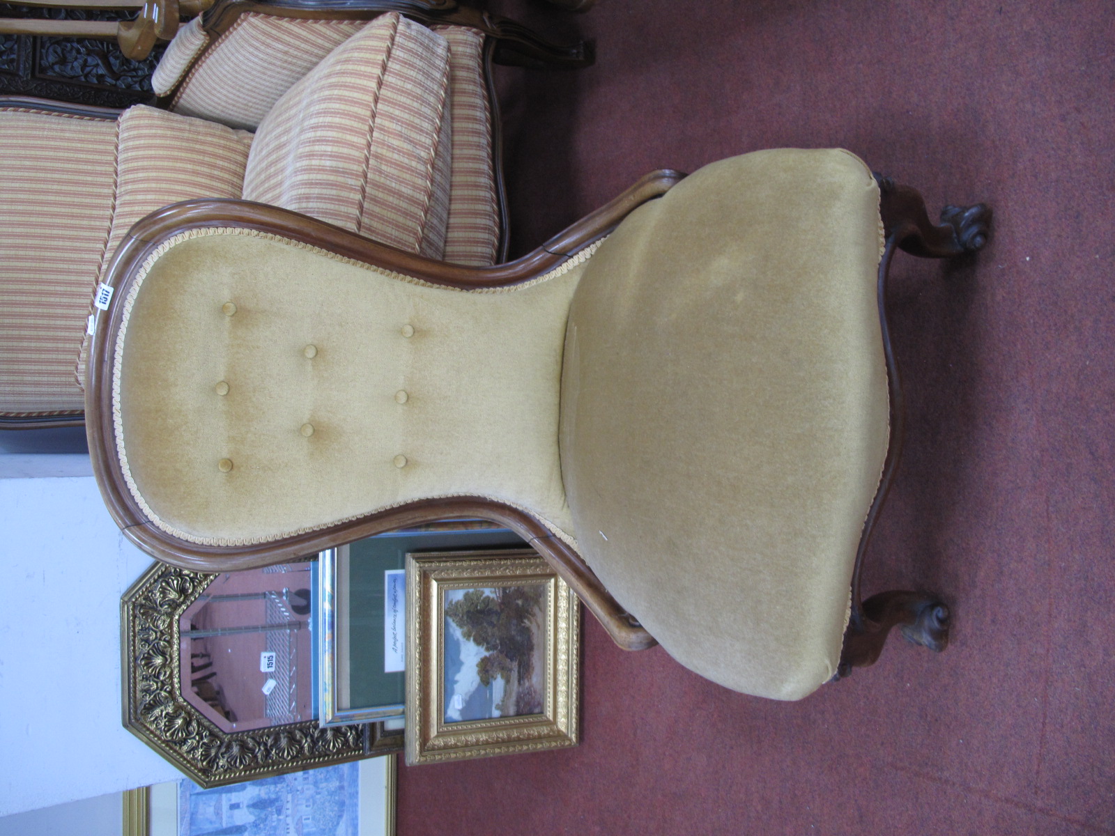 A XIX Century Mahogany Spoon Back Chair, with cabriole legs, scroll feet.