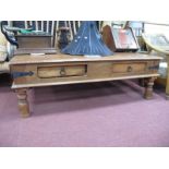 A Hardwood Colonial Rectangular Shaped Coffee Table with two drawers on corner brackets, turned
