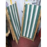 A Pair of Striped Folding Deck Chairs. (2)