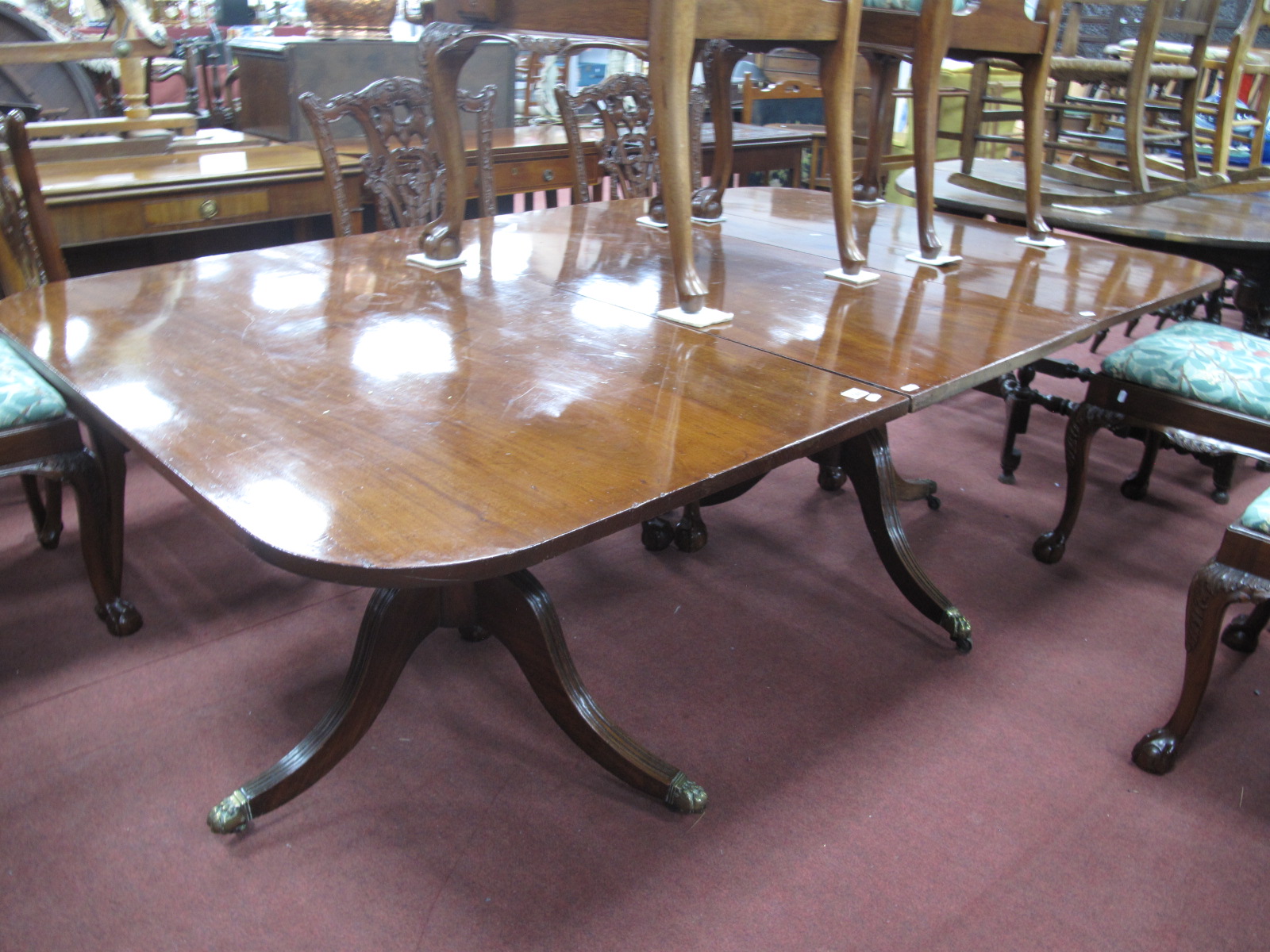 A XIX Century and Later Mahogany Twin Pedestal Dining Table, on reeded swept legs (with centre