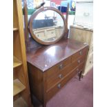An Edwardian Inlaid Dressing Table, with oval mirror, tapering supports, two short drawers, two long