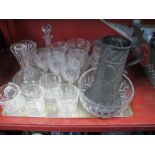 A Pewter Claret Jug, the body with circular pattern, cut glass decanters, bowls, water jug etc:- One