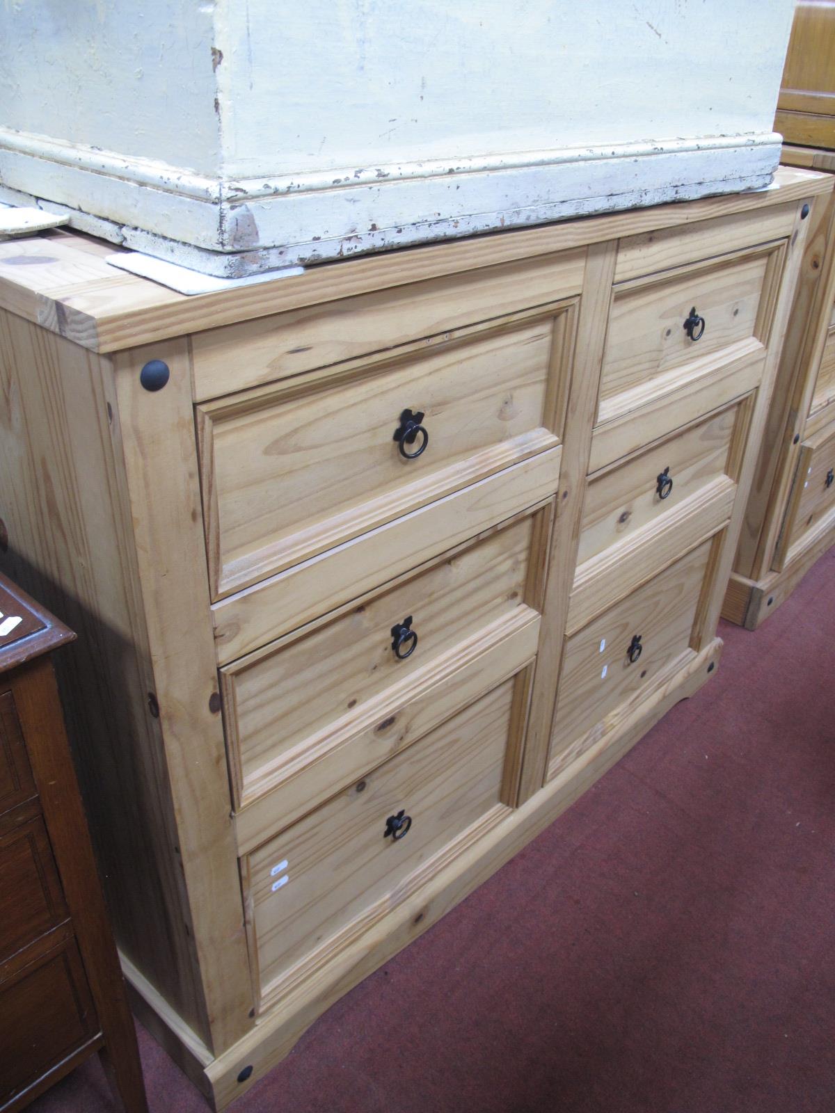 A Pine Chest of Drawers, with six small drawers, on a plinth base, 133cm wide.