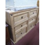 A Pine Chest of Drawers, with six small drawers, on a plinth base, 133cm wide.