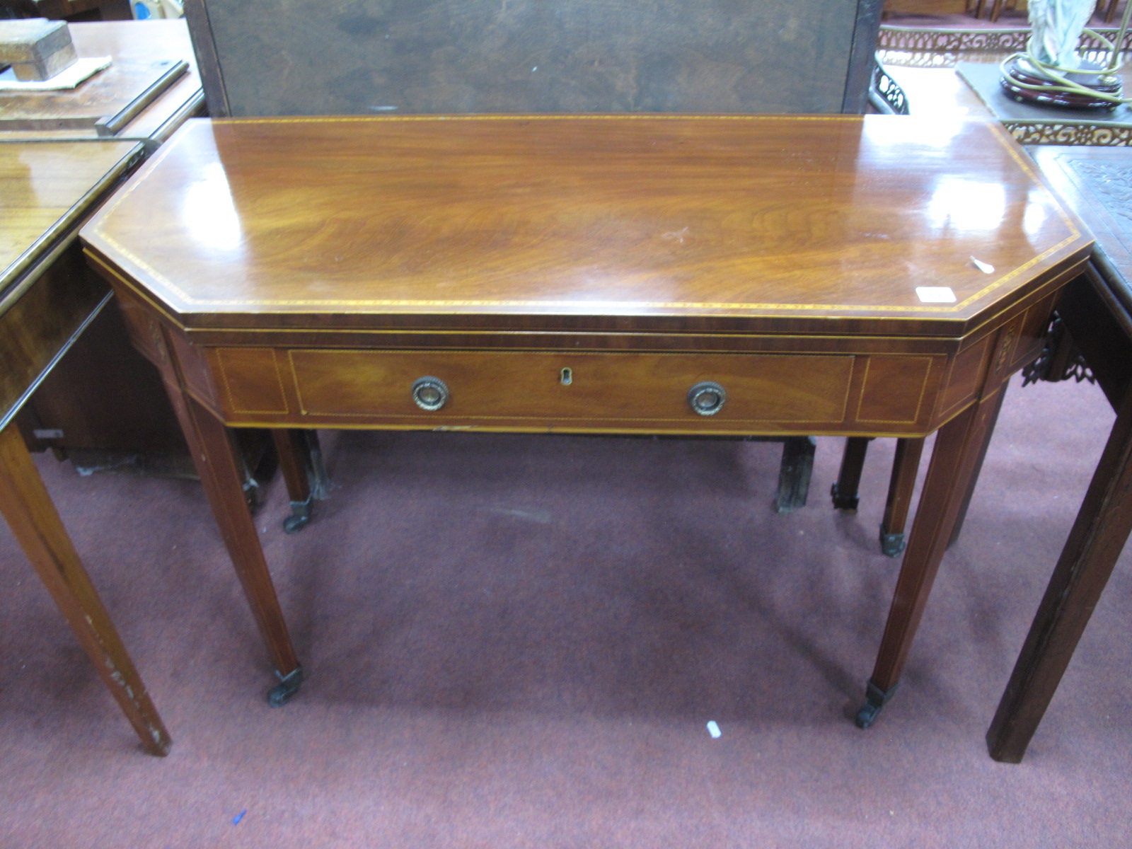 An Early XIX Century Mahogany Tea Table, fold over top, with boxwood inlay-stringing, single drawer,