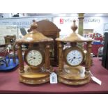 A Pair of Hermle Mantle Clocks, mounted in Yew wood, Burr elm? cases, with finial tops, turned