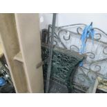 Metal Garden Gate, plastic planter in metal stand, metal table supports.