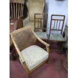 A Pair of Oak Bedroom Chairs, together with a armchair with a caned back, drop in seat. (3).