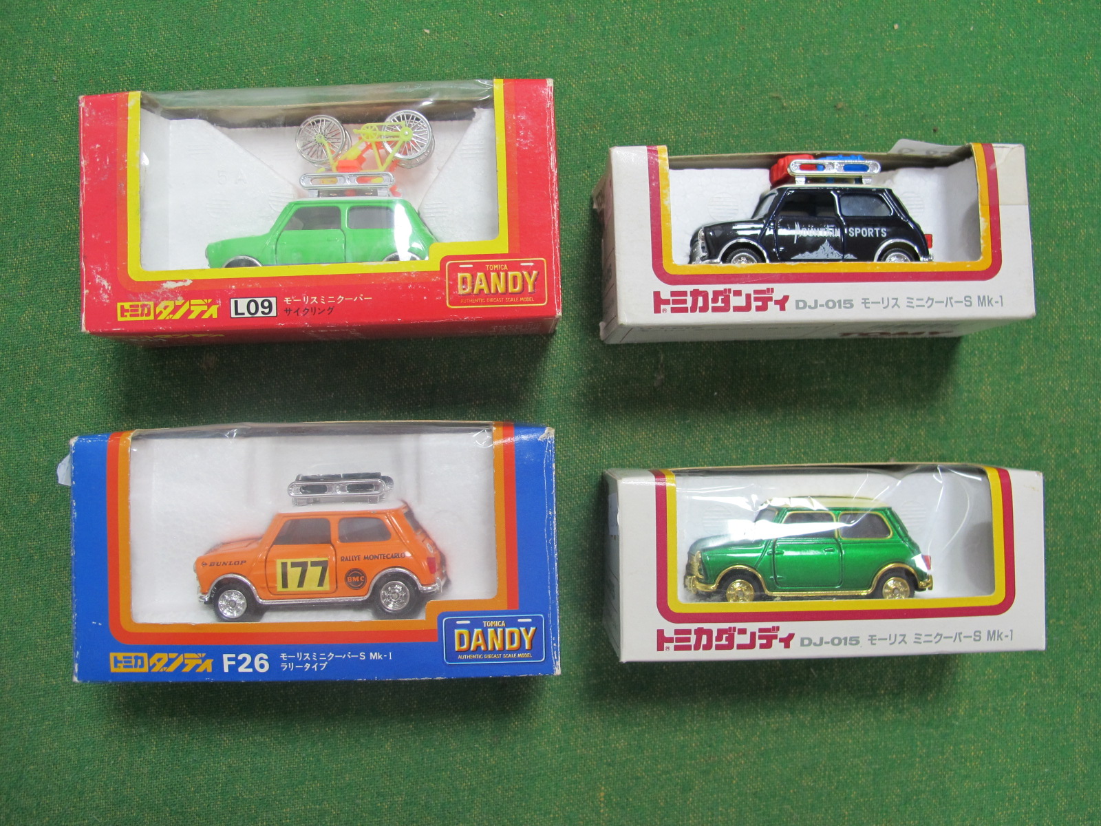 Four Tomica Dandy (Japan) 1:43rd Scale Diecast Model Mini's, including #LO9 'Green' with two