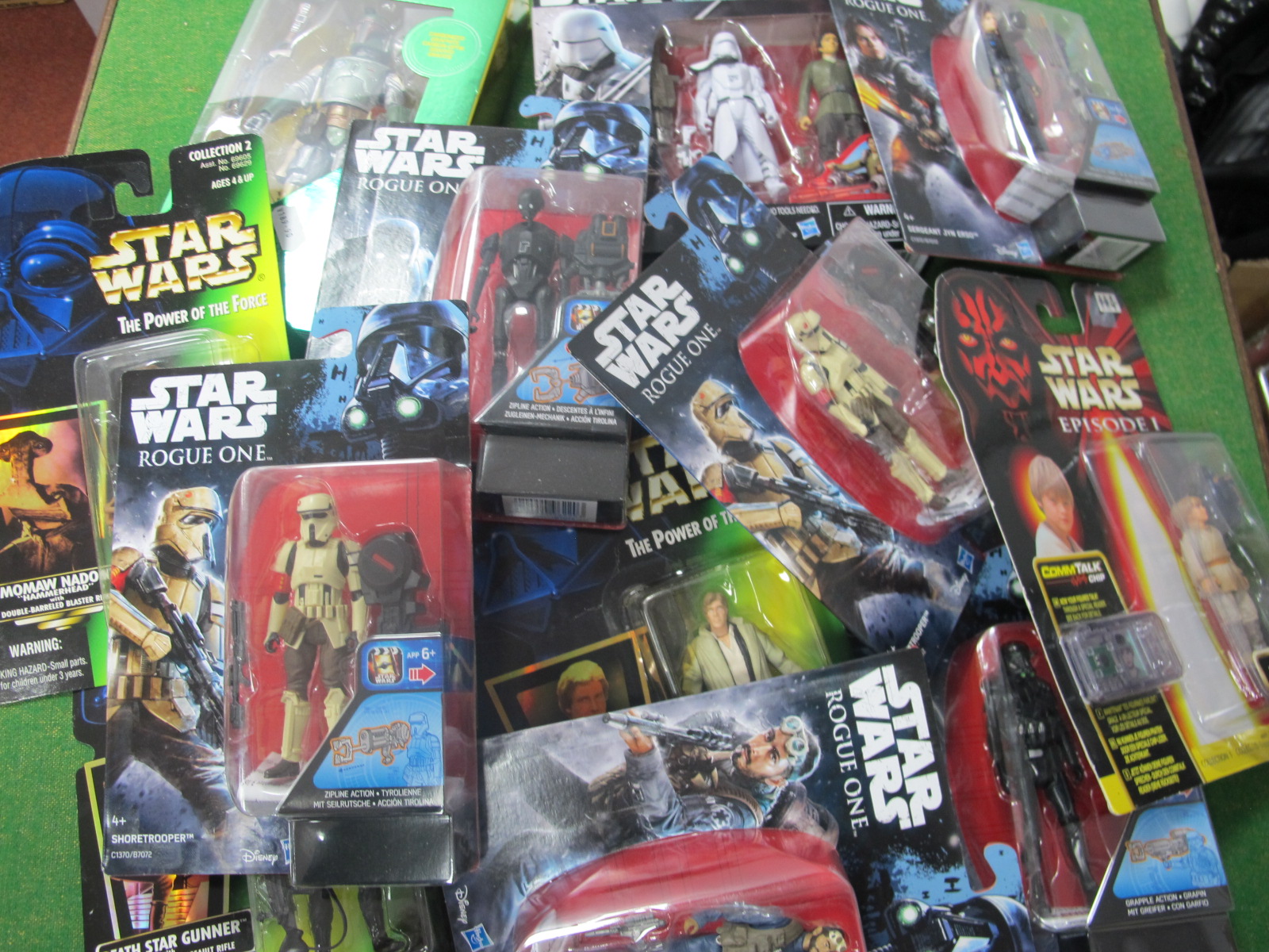 Over Twenty Bubble Packed Star Wars Action Figures.