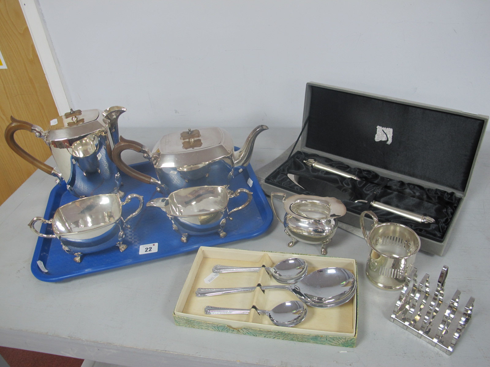 A Lister Horsfall Art Deco Style Plated Four Piece Tea Set, together with a plated cream jug, modern