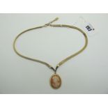 WITHDRAWN A Vintage Gilt Metal Cameo Style Costume Necklace, with oval drop, on mesh link chain.