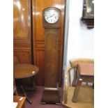 A 1930's Oak 'Enfield' Grandmother Clock, silver dial shaped base, on bracket feet, 144cm.