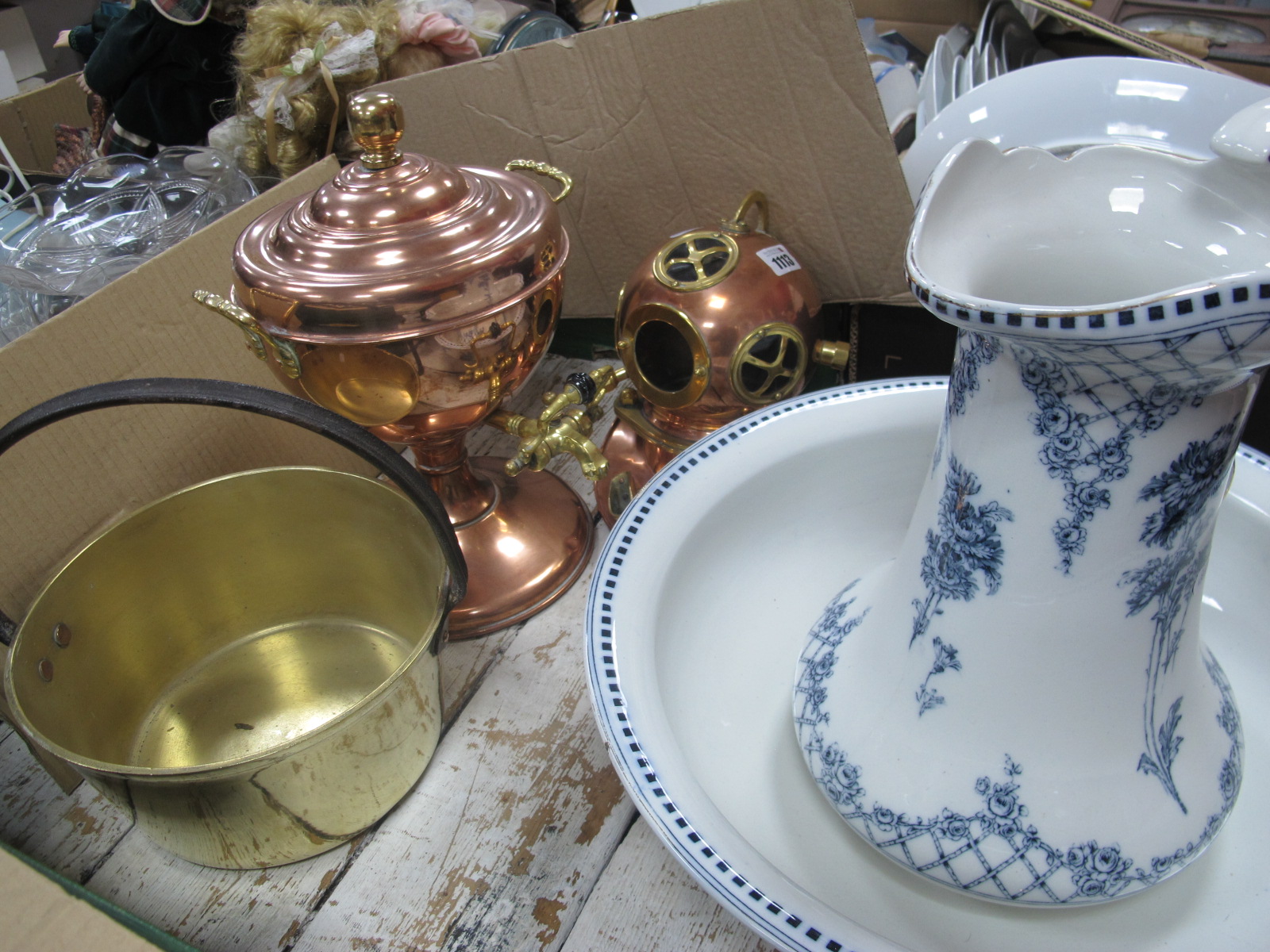 Brass Jam Pan, with iron loop handle, copper tea urn, model diving helmet, Losol wash jug and bowl.