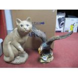 Reconstructed Figure of a Seated Cat; cat 40cm high; together with a resin figure of an eagle.