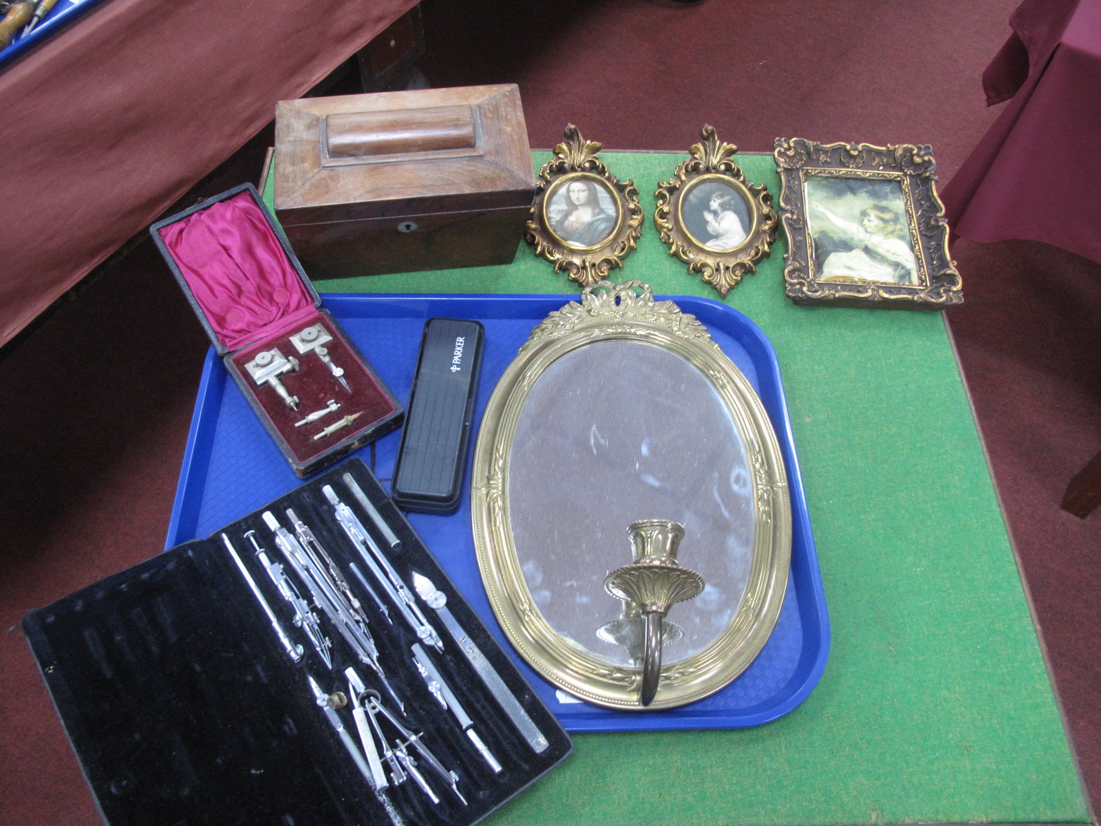 A Brass Framed Oval Wall Mirror, prints, XIX Century tea caddy, cased geometry items, Parker pen.