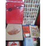 Sheet Music, Monopoly, stamp album, Bueller's sign, framed cigarette cards.