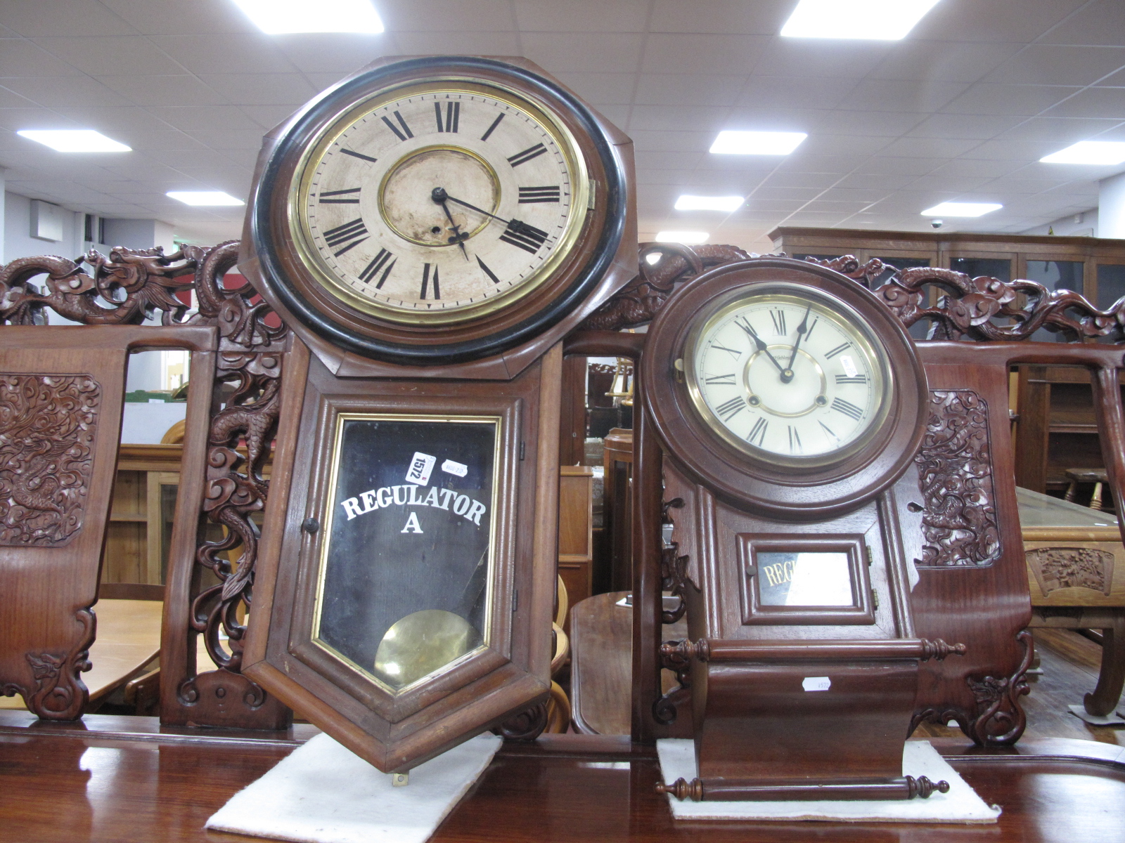 A XIX Century Ansonia Regulator Wall Clock; together with one other mahogany regulator wall