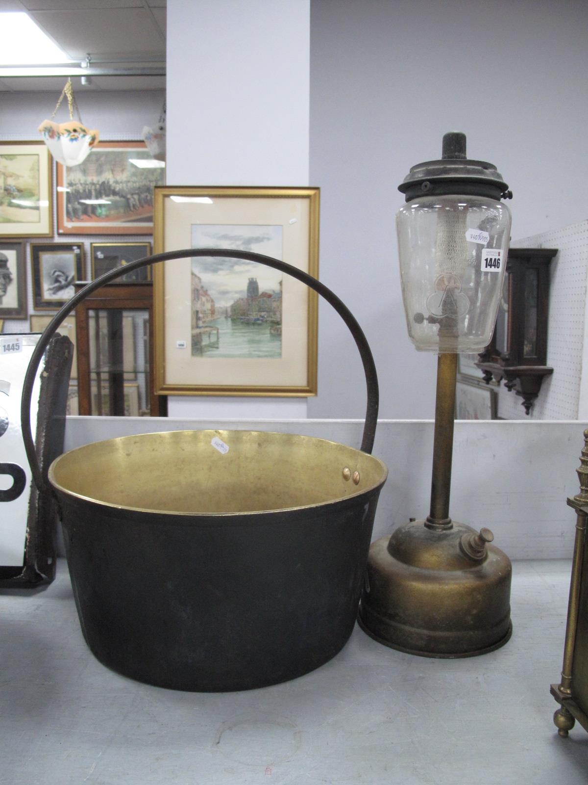 A Tilley Table Lamp, brass jam pan with iron loop handle, 35.5cm diameter (2).