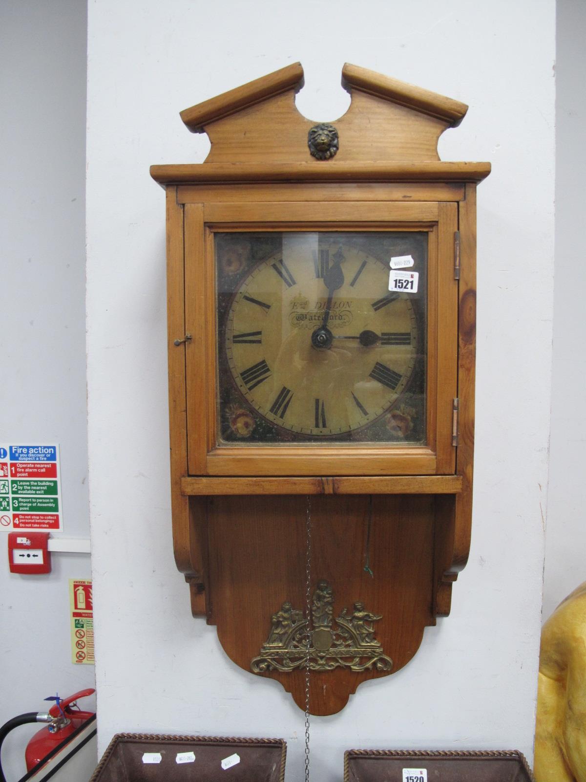 Pine Wall Clock, with a broken pediment, white dial, (Ed. Dillon Waterford), shaped base, two