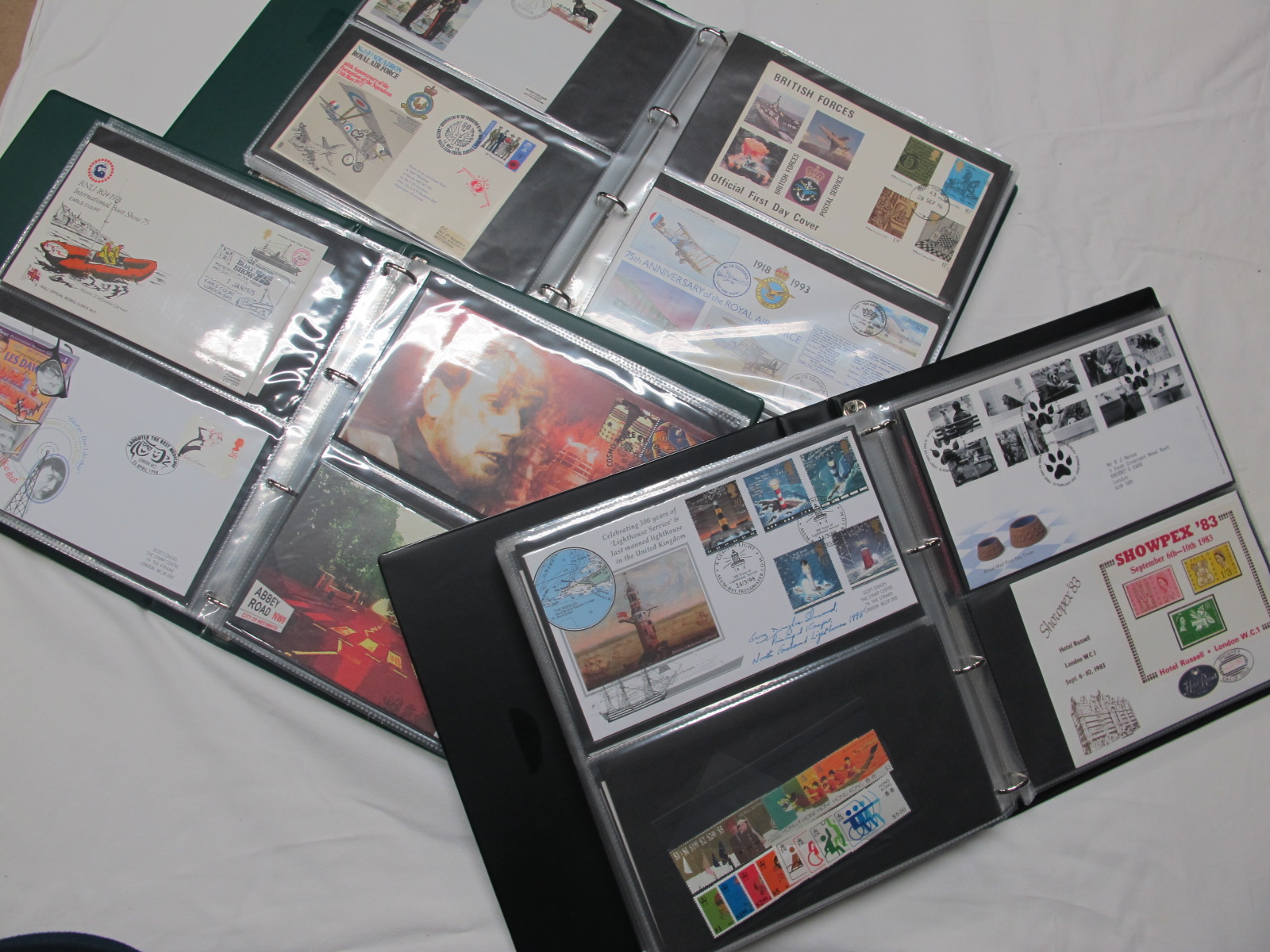 A Box Containing Three Large Binders, Housing G.B Covers, Presentation Packs, Commonwealth and World
