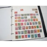 A Collection of Stamps From Egypt and Ecuador, early to modern, housed in a loose leaf album.