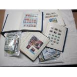 A Large Collection of Jersey Stamps and Mini Sheets, housed in four luxury albums and loose in