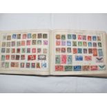 Early 'Improved Stamp Album' (18th Edition), containing Worldwide stamps, mostly pre WWII.