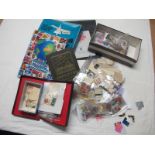 A Box Containing Mint and Used Stamps, in packets and loose and a number of albums.