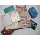 A Box Containing a Mixed Collection of Stamps, of the World FDC's, in an album and a Stanley Gibbons