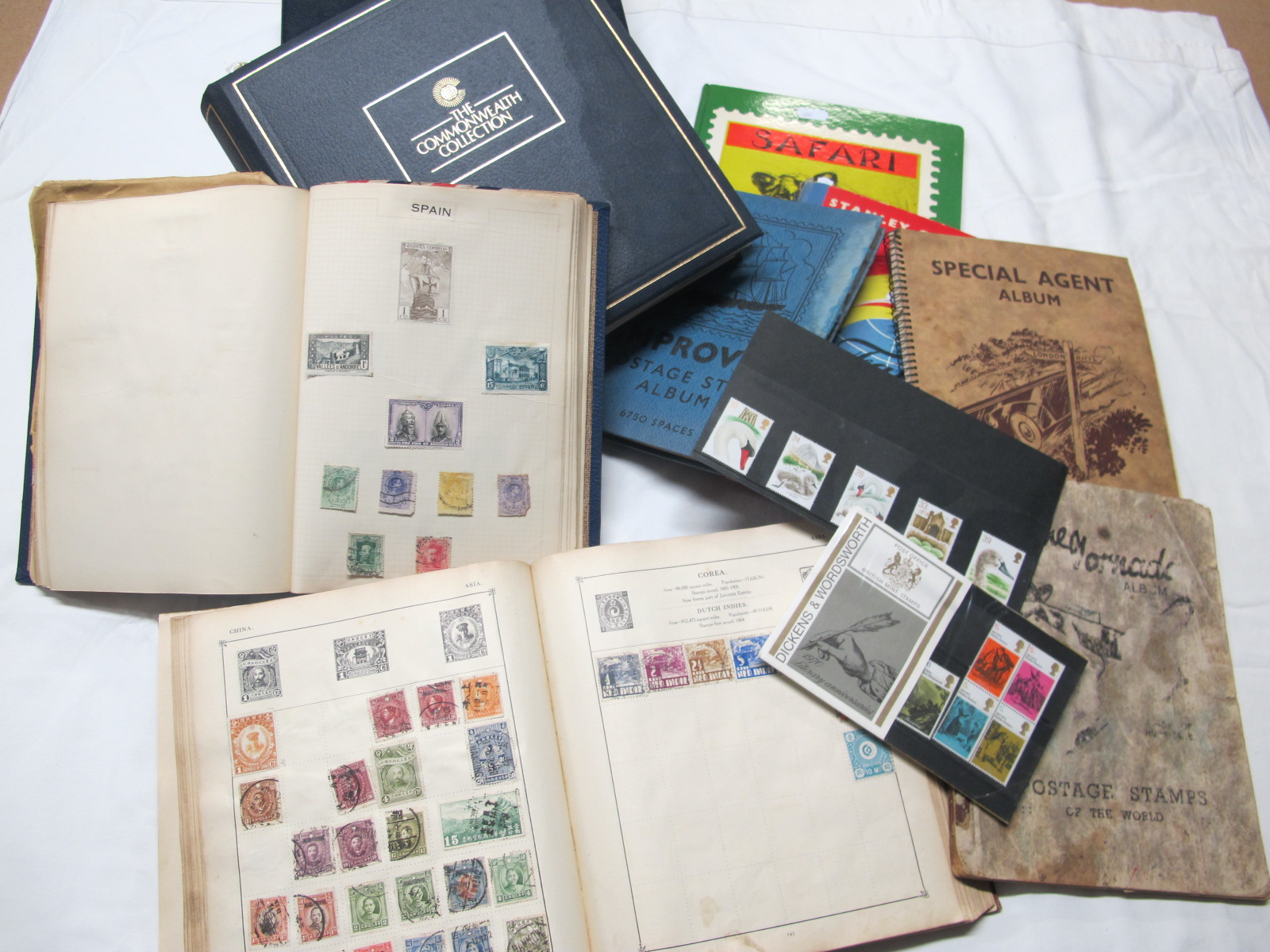 A Box Containing a Number of Albums and Packets of Stamps and Covers. from Commonwealth and World