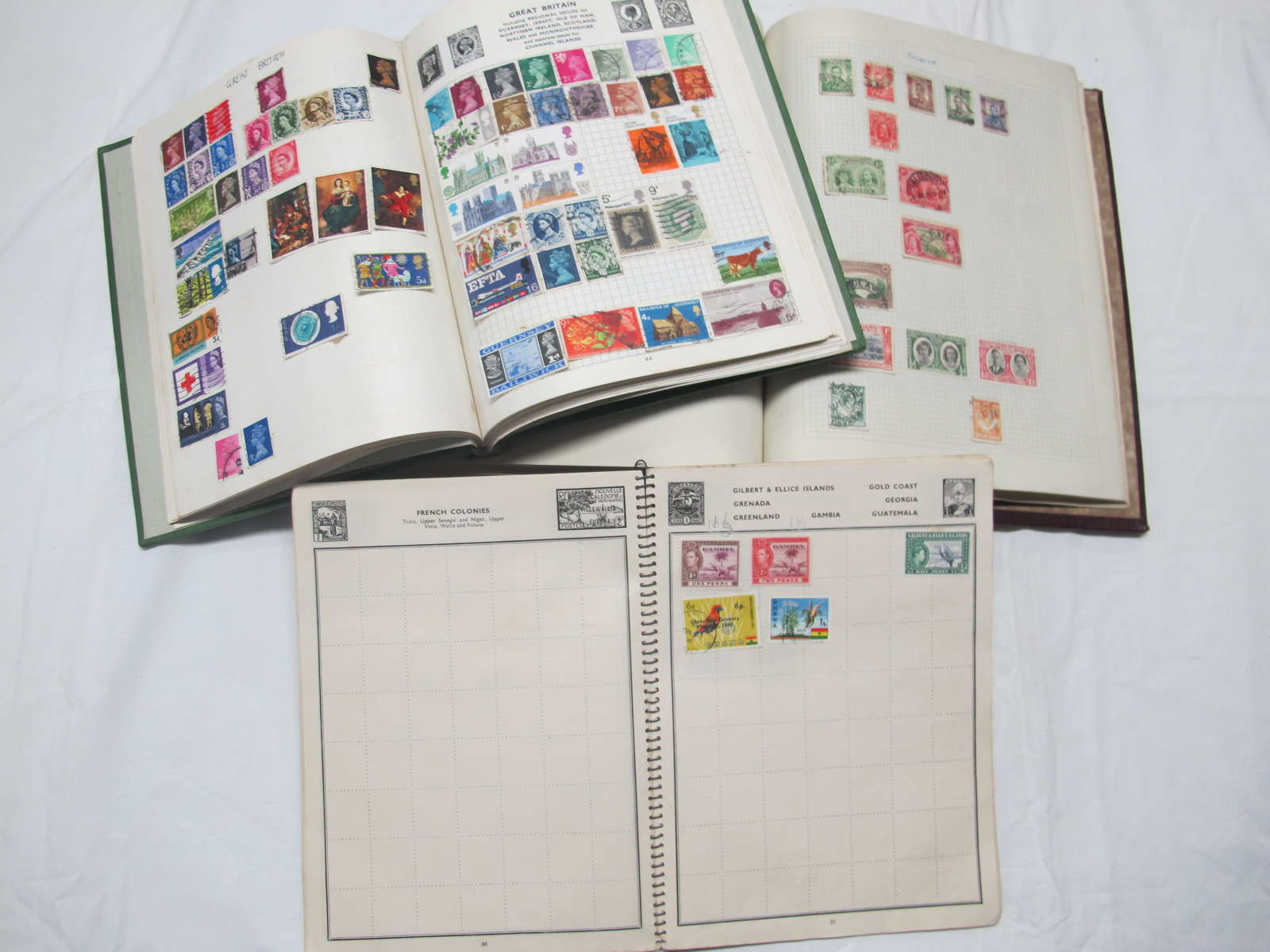 Three Albums of G.B, Commonwealth and World Stamps, in three albums, a few hundred, mixed mint and