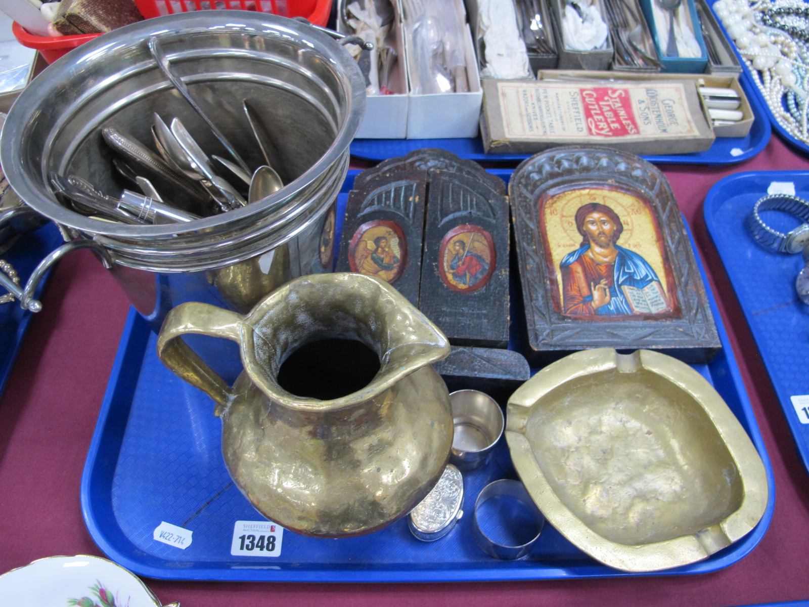 Heavy Brass Jug and Ashtray, Icon copies, ice bucket, cutlery, etc:- One Tray.