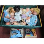 Vulcan Junior Child's Sewing Machine, together with a collection of dolls with rubber faces, etc:-